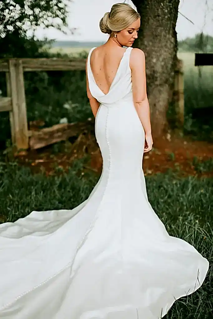 Bride outdoors in wedding dress